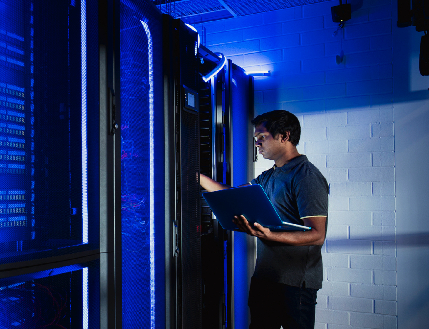 man carrying out data center support