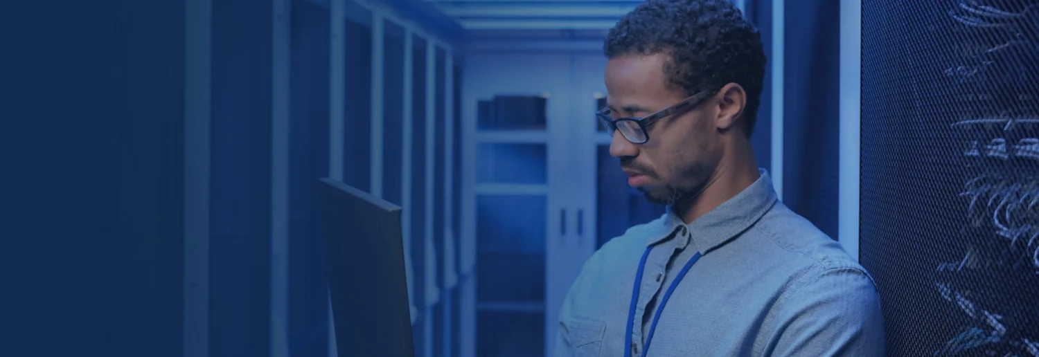 man in data center providing Dell EMC Isilon support