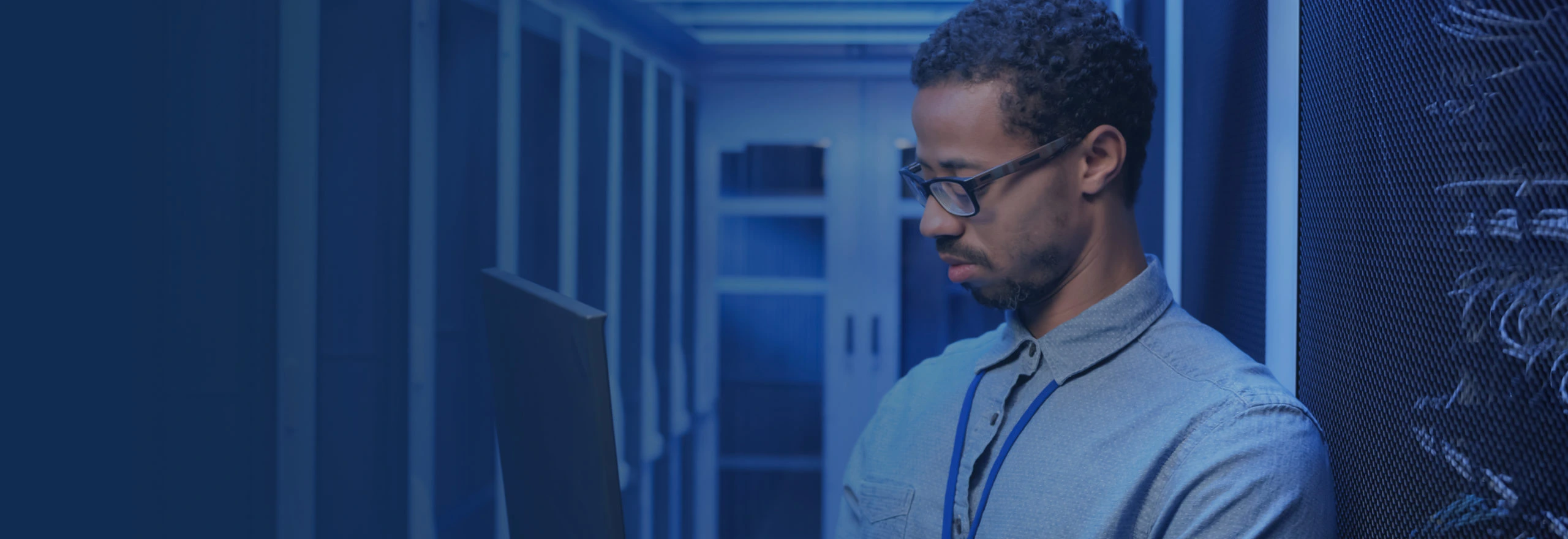 man in data center providing Dell EMC Isilon support