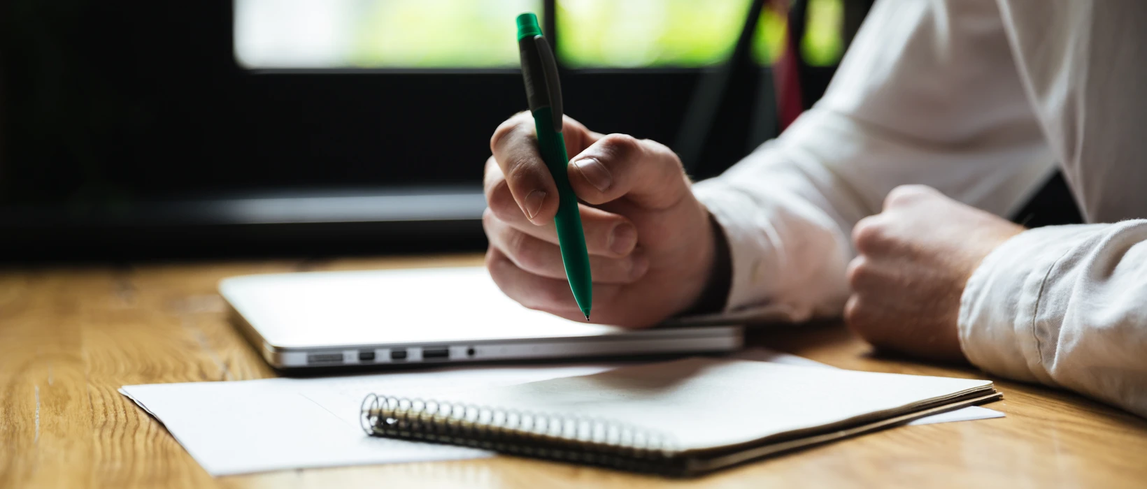 man writing a cloud migration project plan example